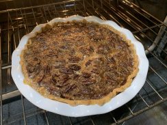 Southern Pecan Pie in the oven baking